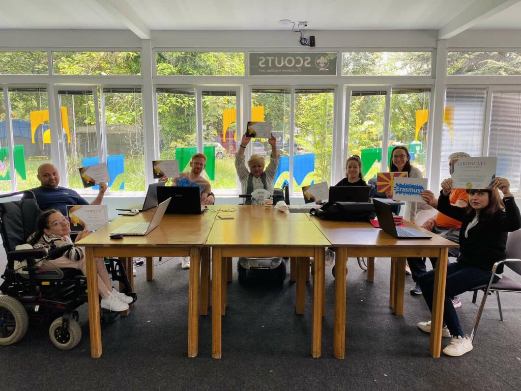 All of the Online Assistants showing off their diplomas for successfully finished course. 
From the left to right: Vecka Koceva, Dule Dimecvski, Dejan Mitev, Sonja Gjorgjievska, Jana Dimova, Elizabeta Jovanovska, Metodija Mete Djingovski  and  Daniela Stojanovska-Djingovska.  